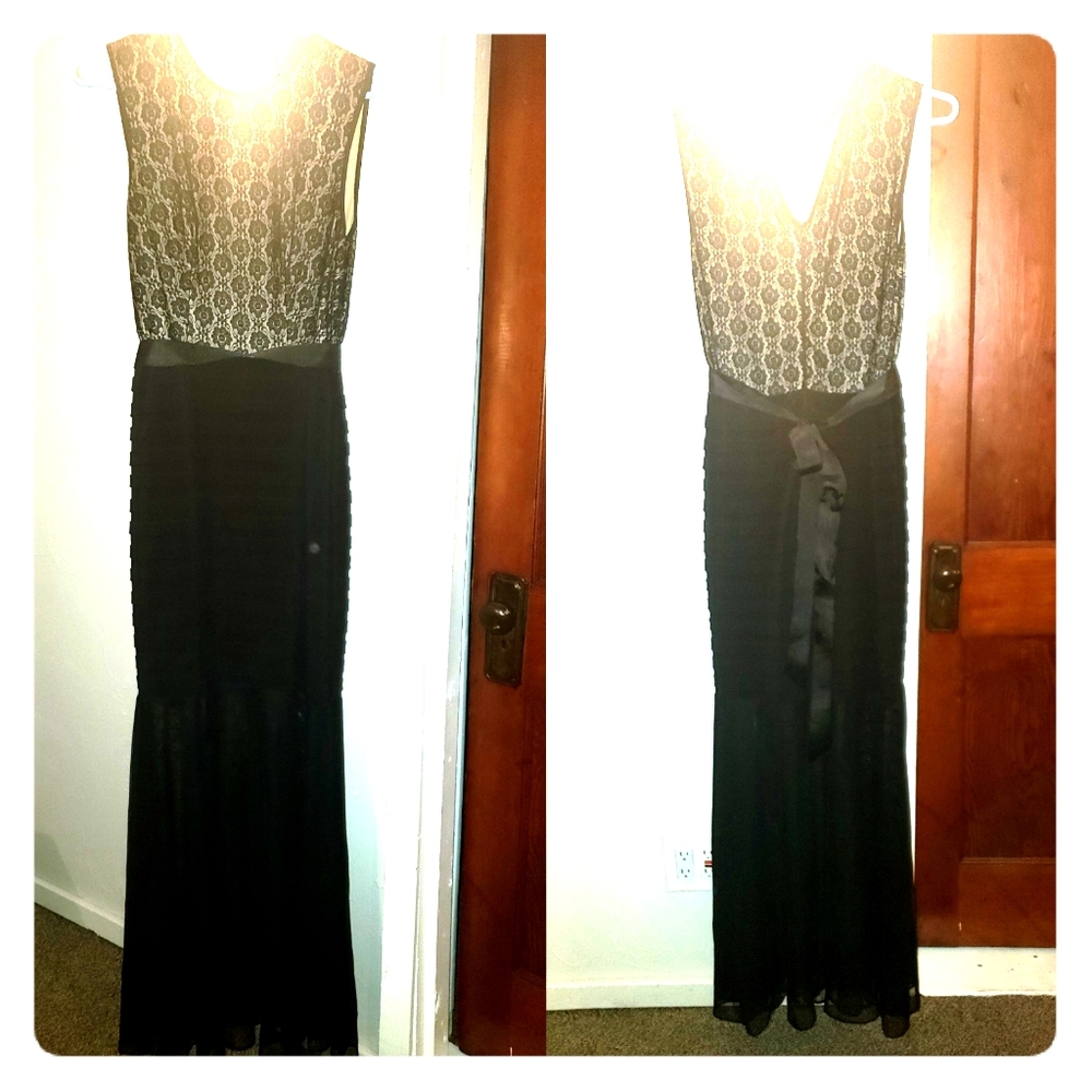 Long dress black lace over tan with belt.